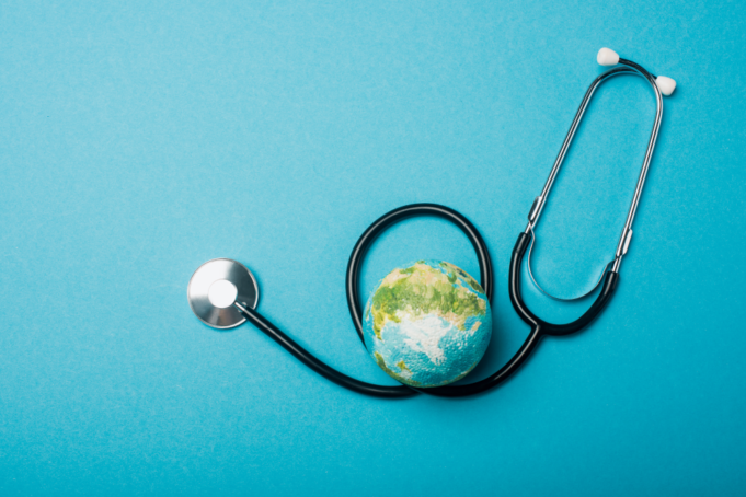 An image of a globe and stethoscope, representing sustainable healthcare.