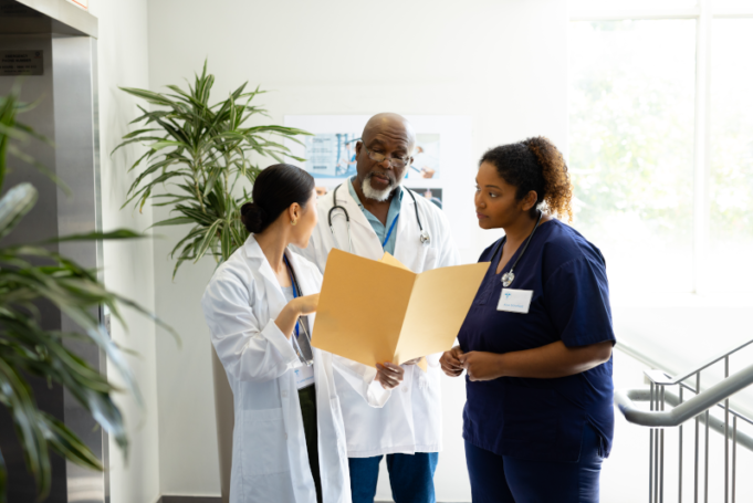 An image representing hospital staff practicing effective healthcare communication.